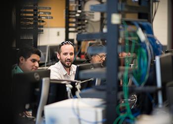 Students working in a lab with network servers